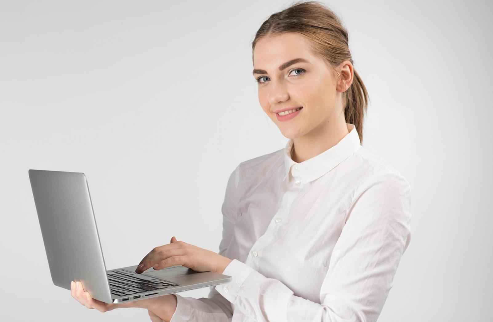 Professional workspace showing mobile app development tools and devices during project planning session